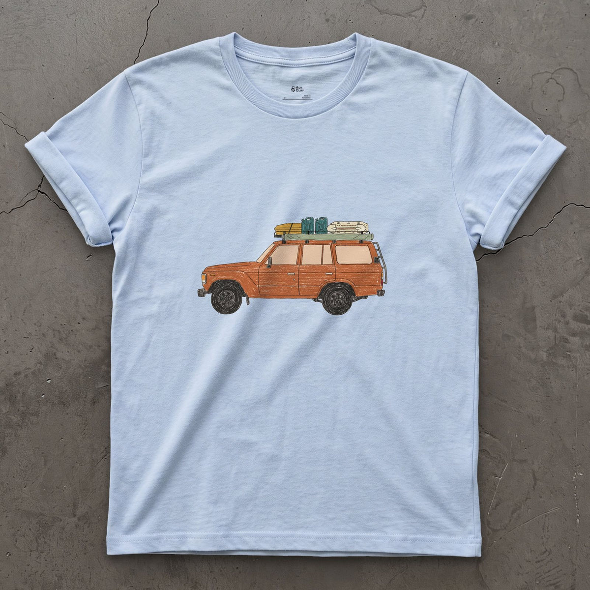 Bags and a Cooler Loaded on the Roof Rack design on a Light Blue Gildan Softstyle t-shirt