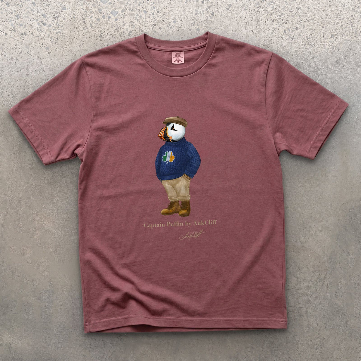 Captain Puffin Irish Trailkeeper on a Brick Comfort Colors t-shirt