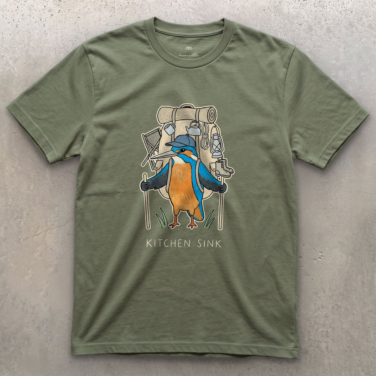 Packed the Kitchen Sink, Kingfisher Hiker design on a Military Green Gildan Softstyle t-shirt