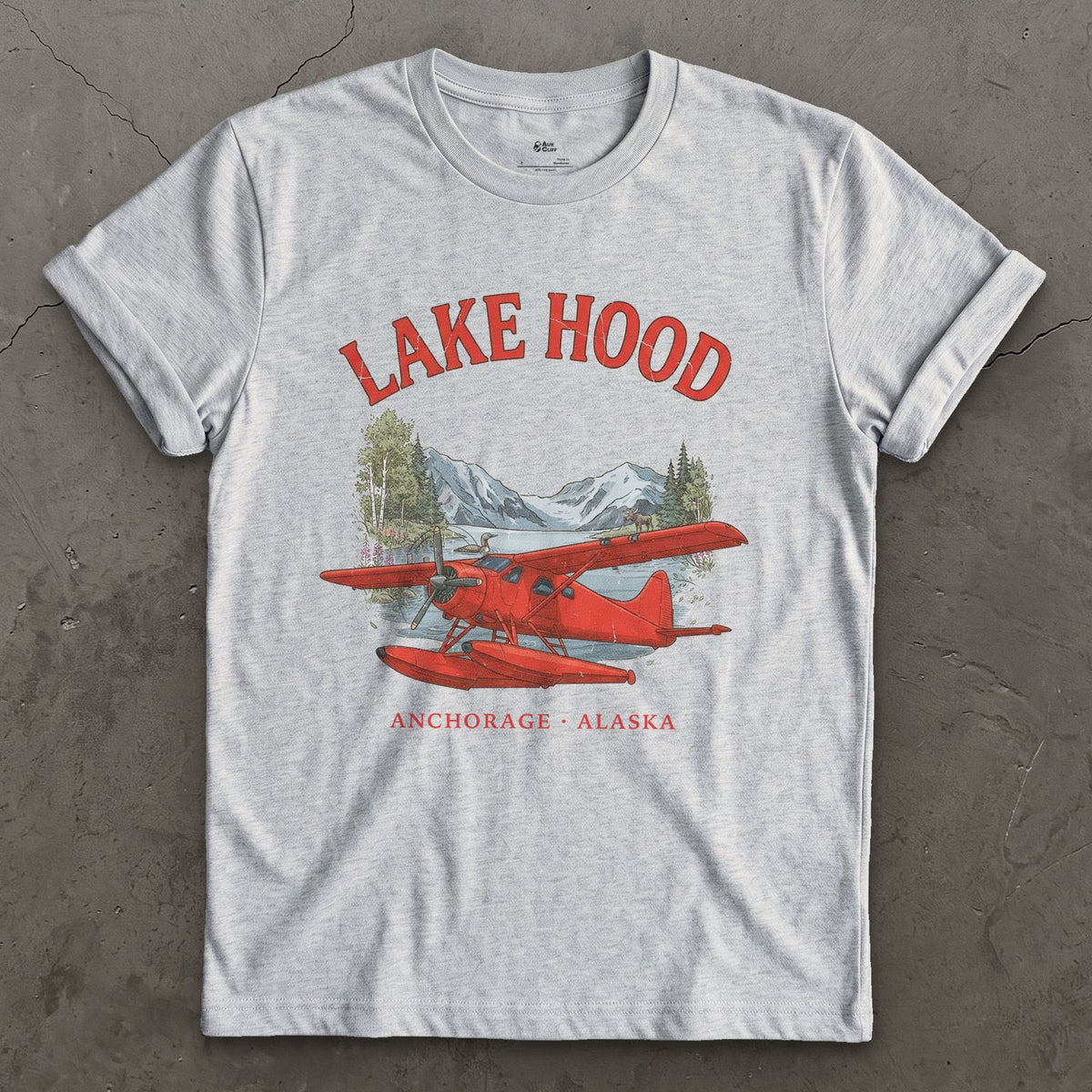 Lake Hood Bush Plane design on a Sport Grey Gildan Softstyle t-shirt