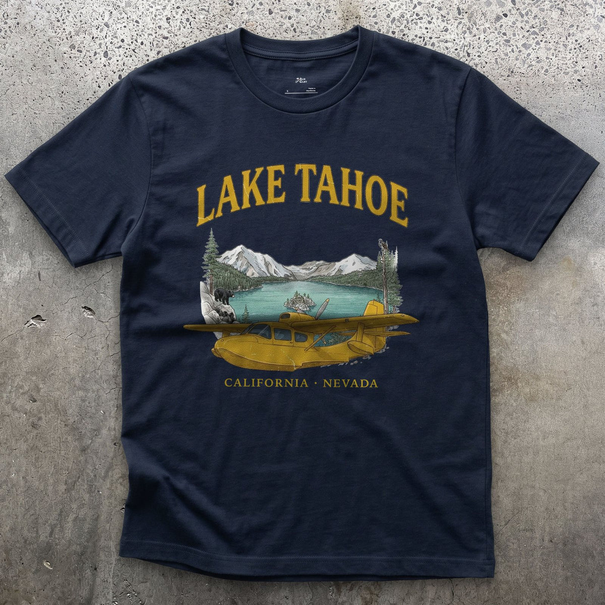 Lake Tahoe Bush Plane design on a Navy Gildan Softstyle t-shirt