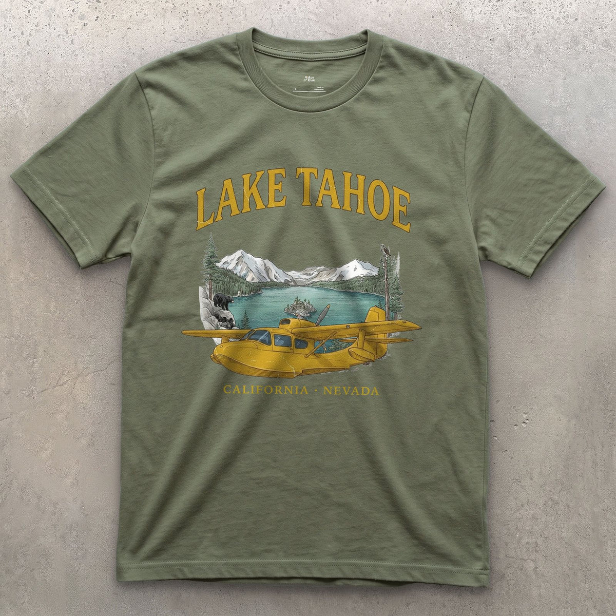 Lake Tahoe Bush Plane design on a Military Green Gildan Softstyle t-shirt