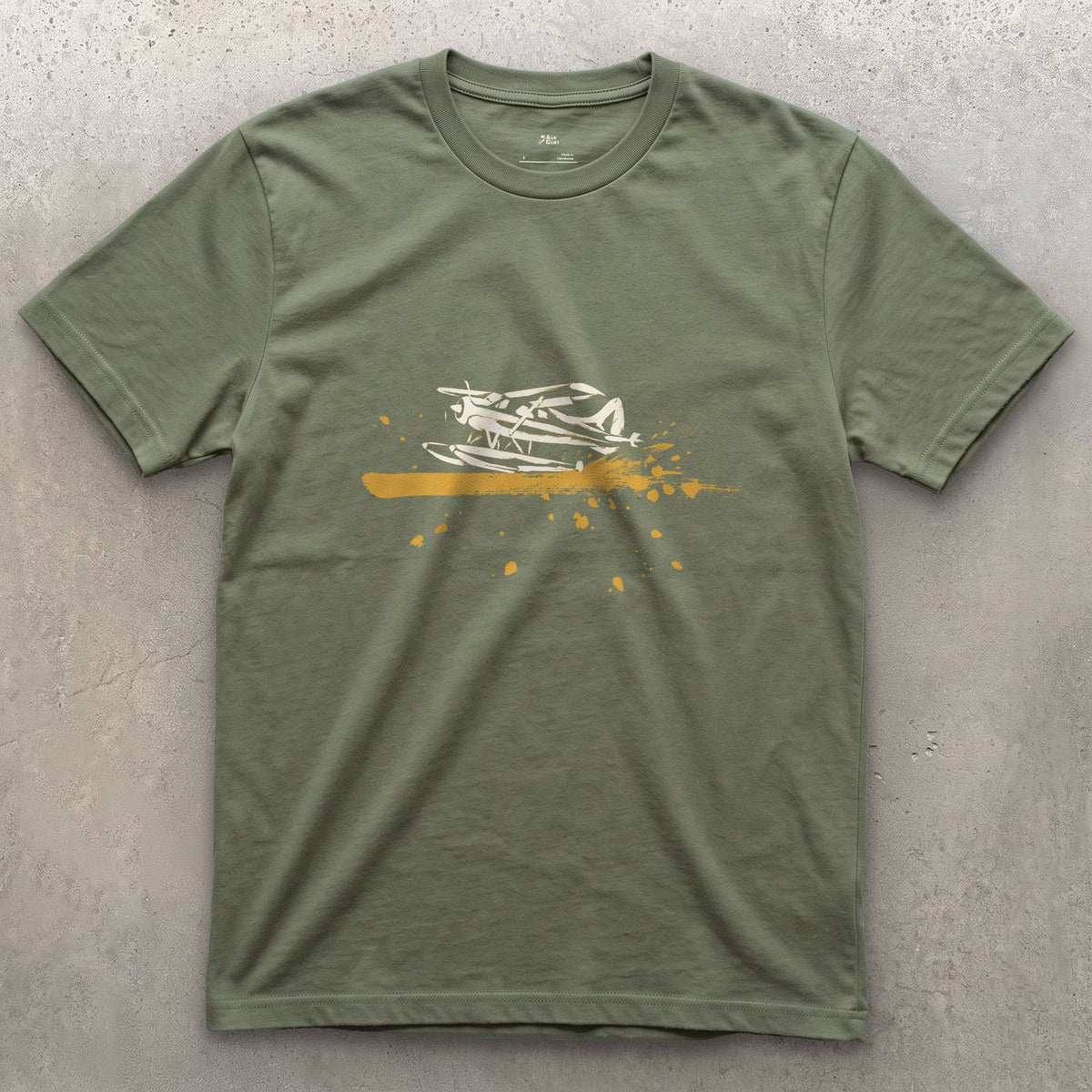 Landed on the Water design on a Military Green Gildan Softstyle t-shirt