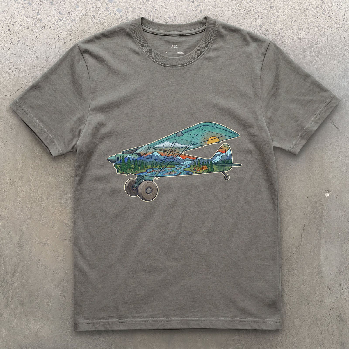 Landing on the Gravel Bar, Bush Plane design on a Charcoal Gildan Softstyle t-shirt