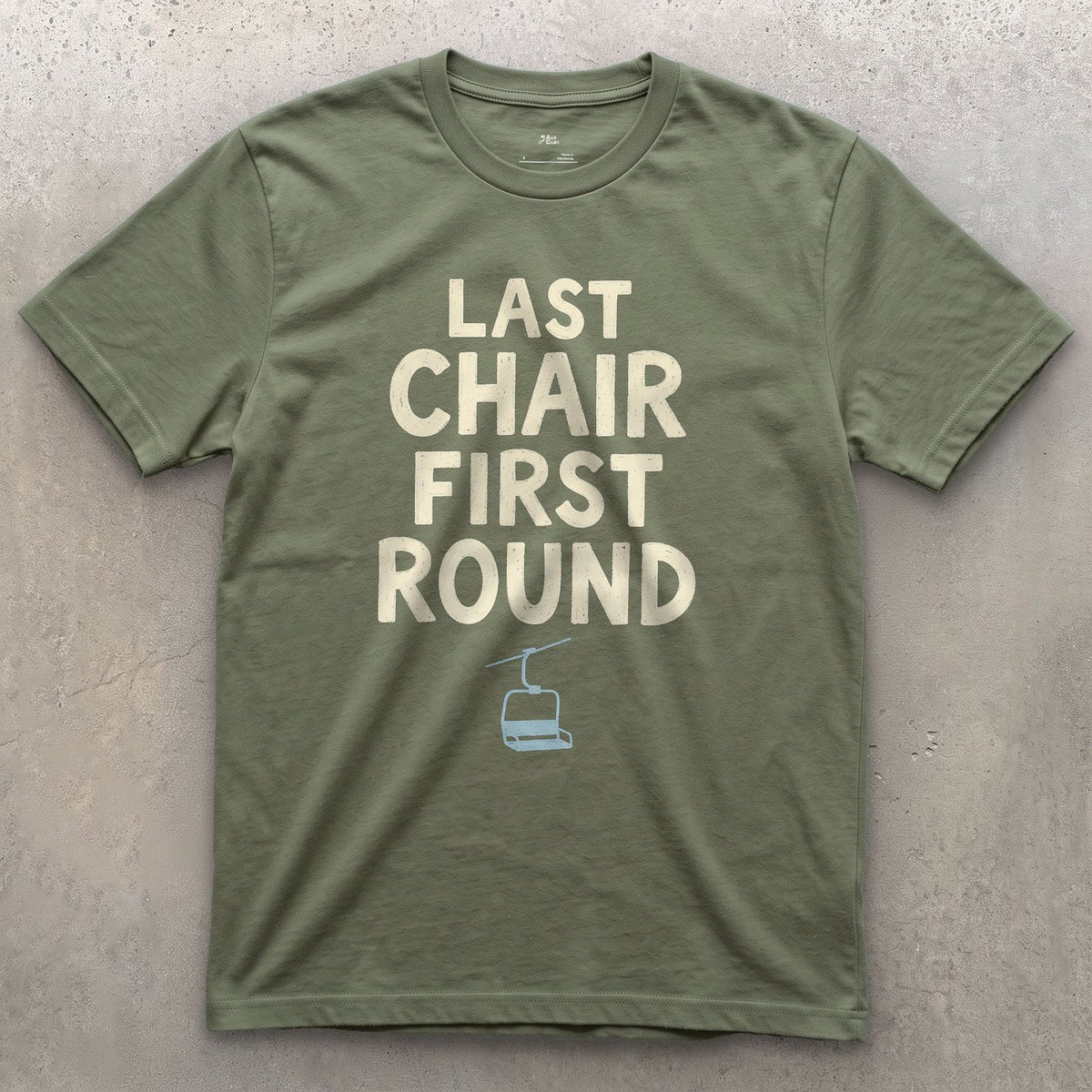 Last Chair First Round Gondola design on a Military Green Gildan Softstyle t-shirt