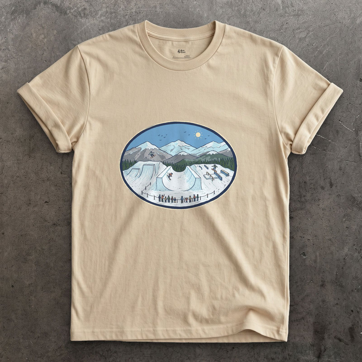 Late Morning in the Snow Terrain Park design on a Sand Gildan Softstyle t-shirt