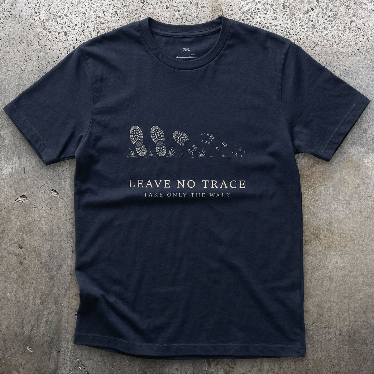 Leave No Trace, Take Only the Walk design on a Navy Gildan Softstyle t-shirt