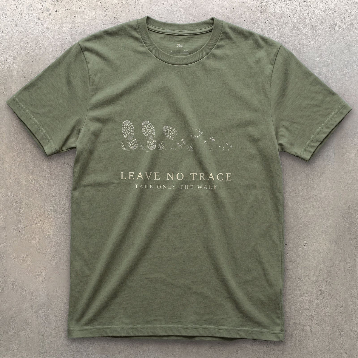 Leave No Trace, Take Only the Walk design on a Military Green Gildan Softstyle t-shirt