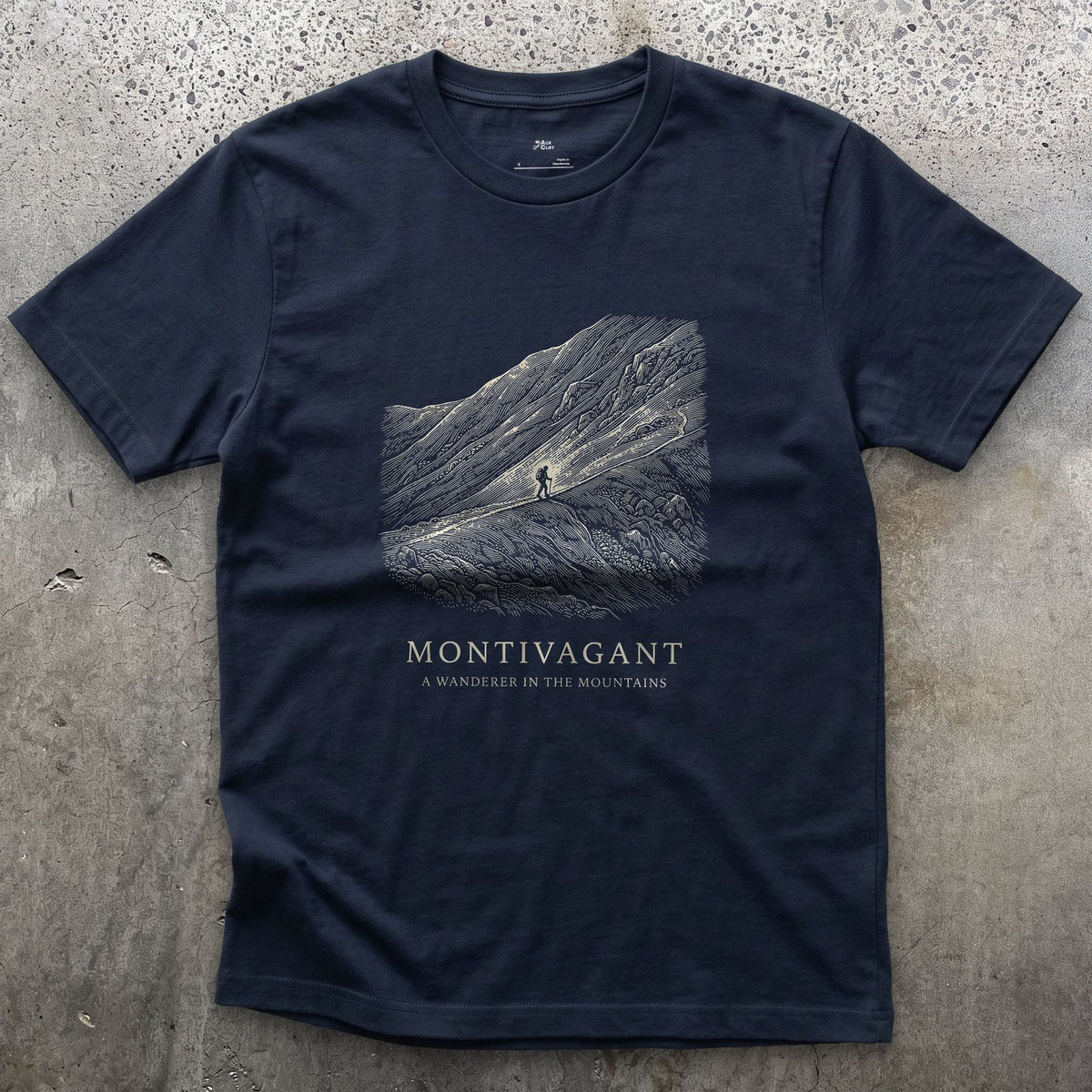 Montivagant, a Wanderer in the Mountains design on a Navy Gildan Softstyle t-shirt