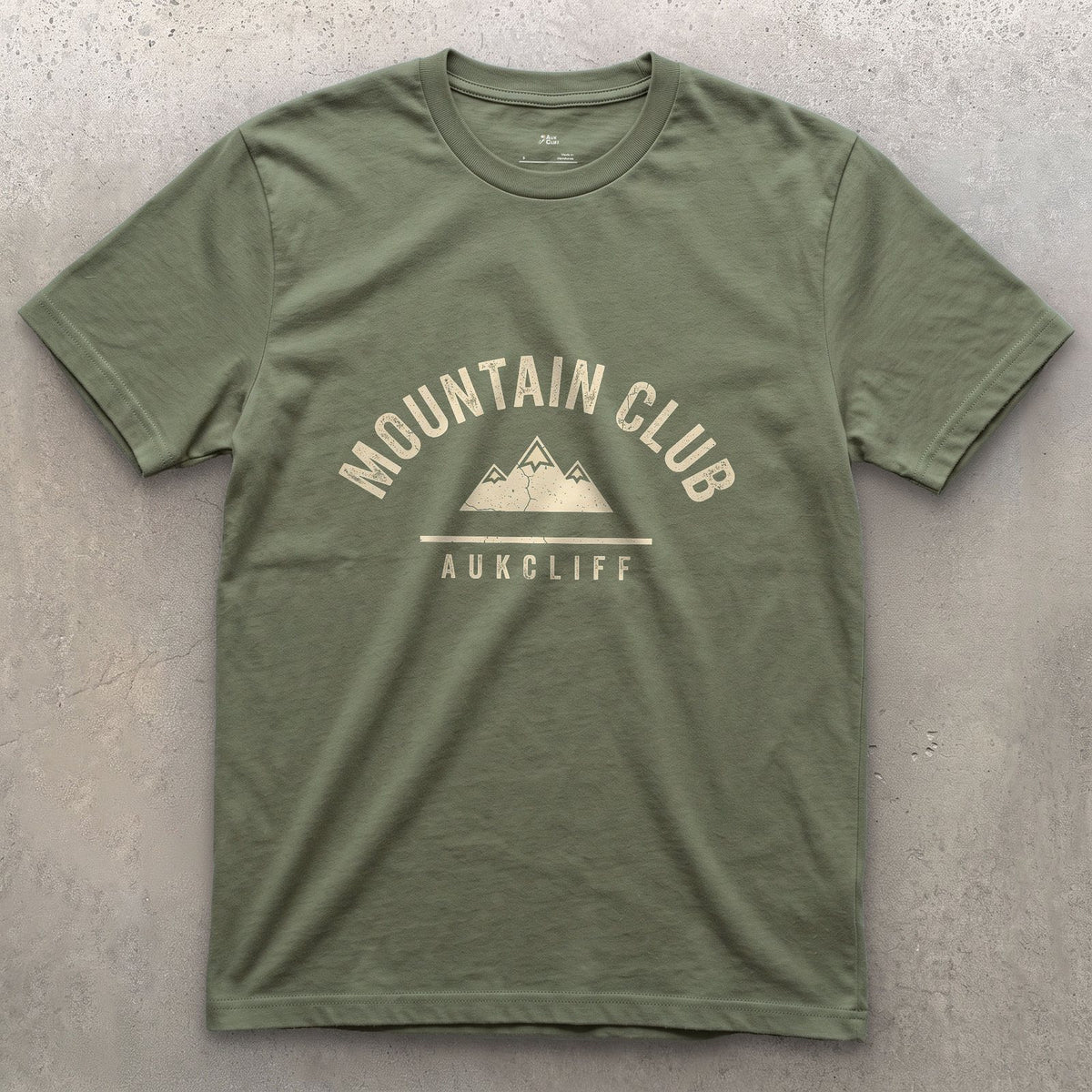Sew It to Your Pack, Mountain Club design on a Military Green Gildan Softstyle t-shirt