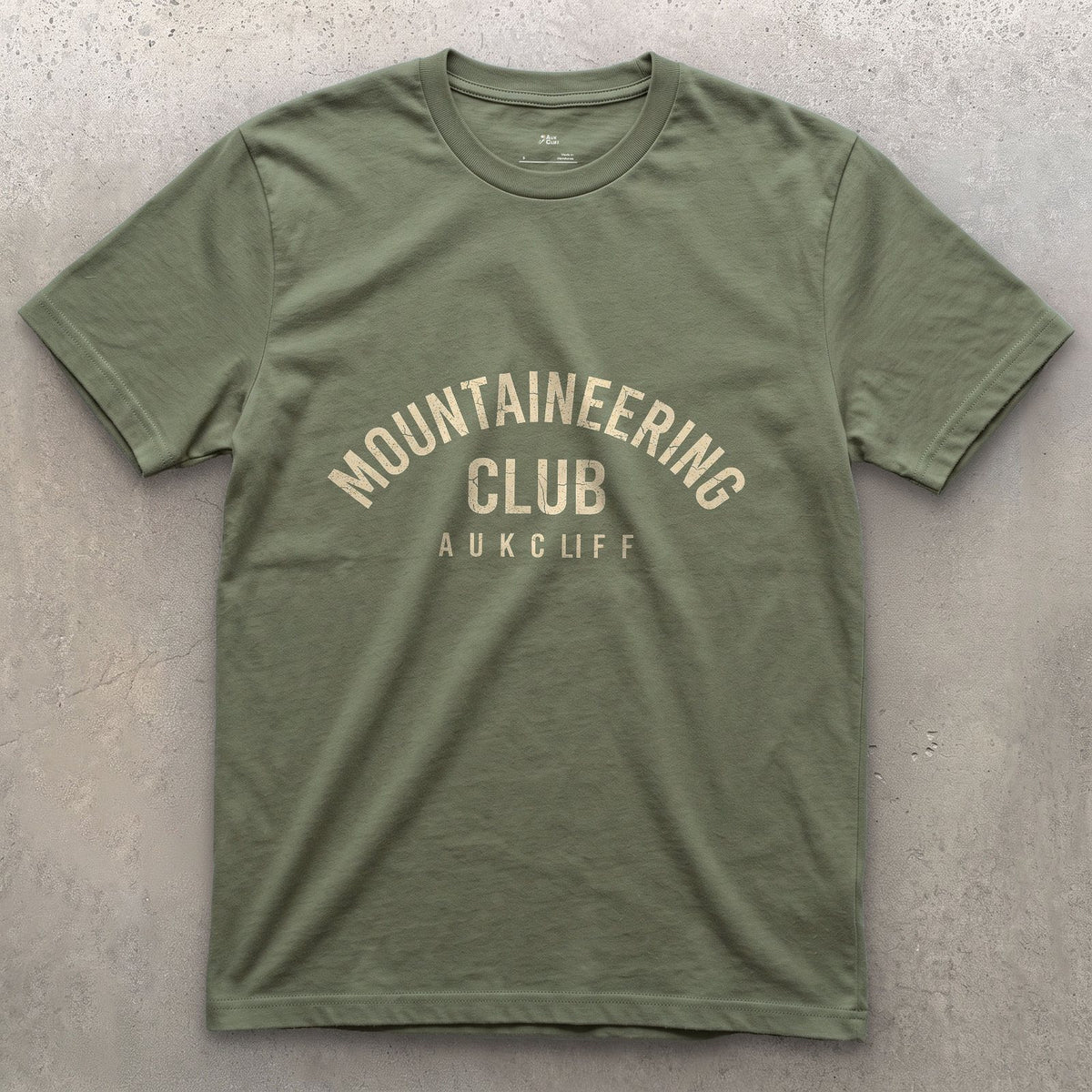 Mountaineering Club Arch design on a Military Green Gildan Softstyle t-shirt