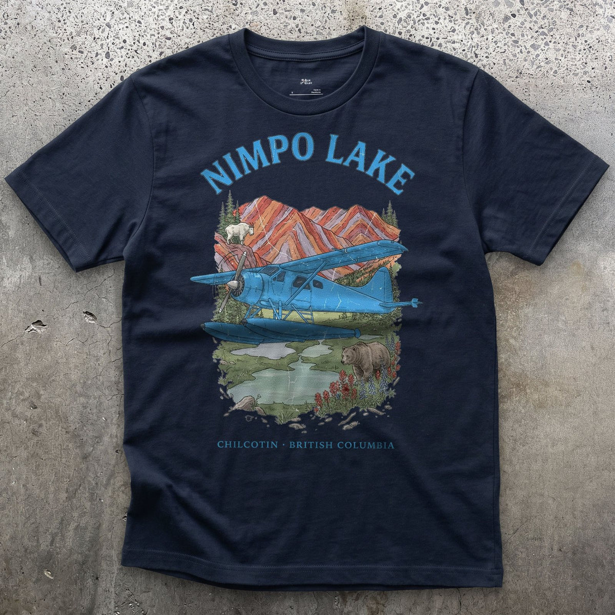 Nimpo Lake Bush Plane design on a Navy Gildan Softstyle t-shirt