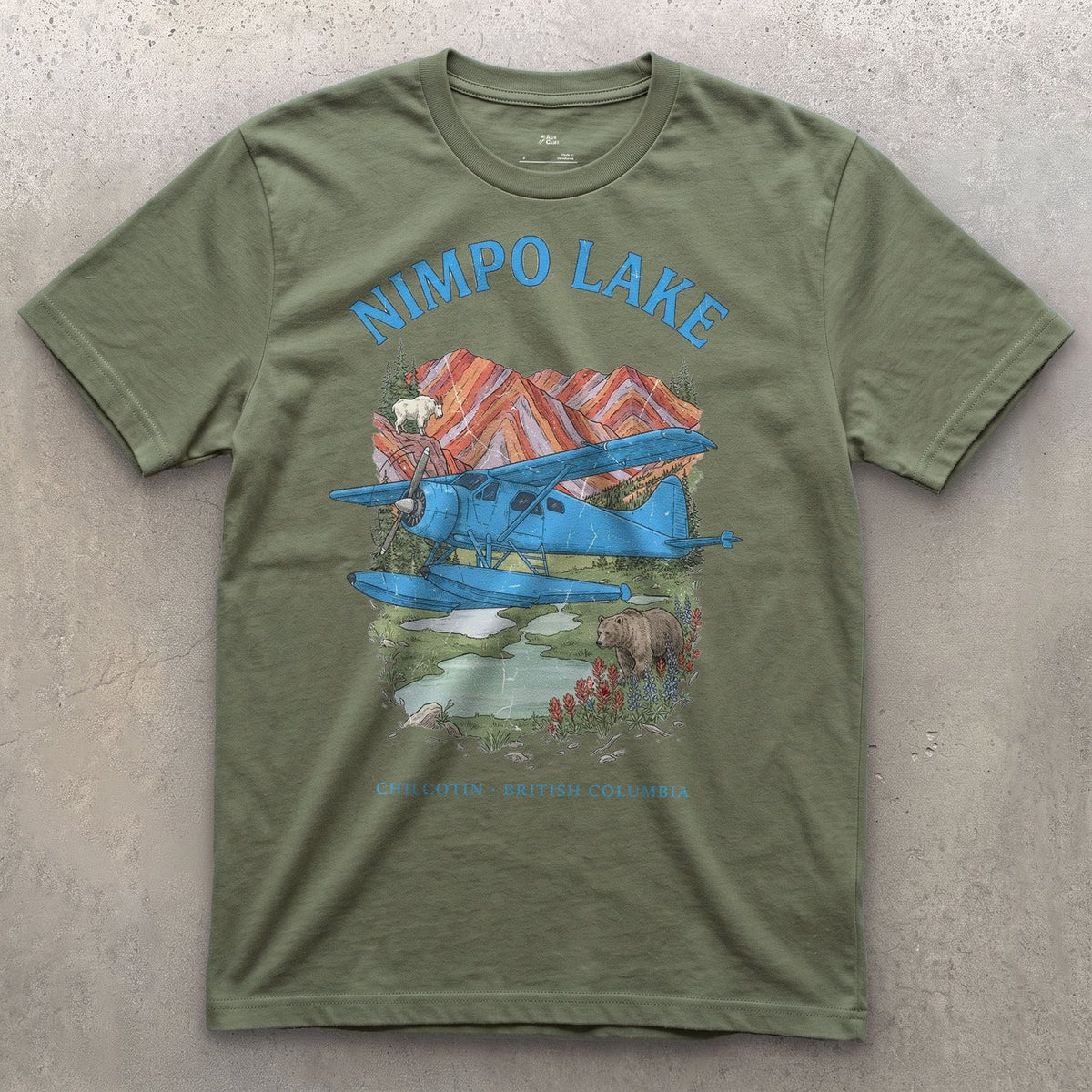 Nimpo Lake Bush Plane design on a Military Green Gildan Softstyle t-shirt