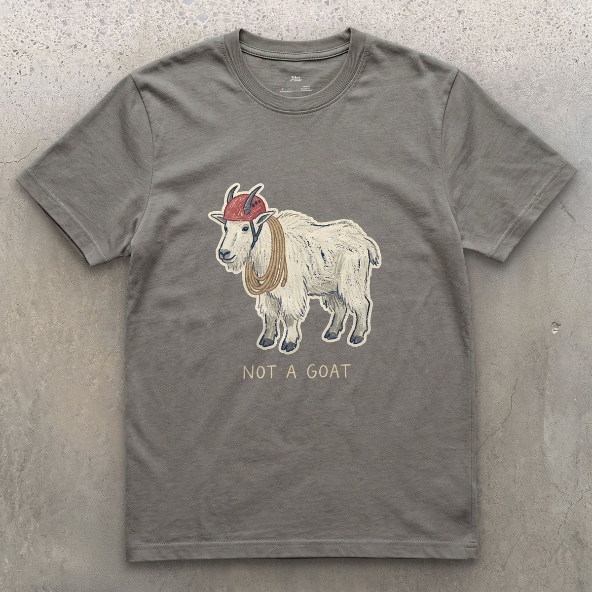 Not a Goat, Mountain Goat design on a Charcoal Gildan Softstyle t-shirt