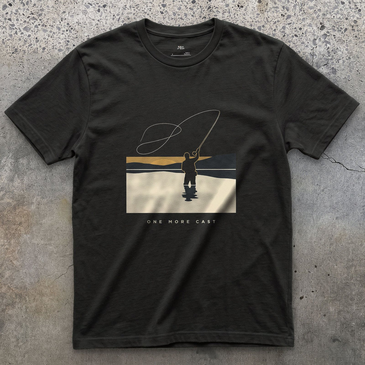 One More Cast, Angler at Sunset design on a Black Gildan Softstyle t-shirt