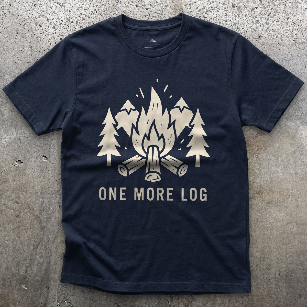 One More Log, Mountains and Firewood design on a Navy Gildan Softstyle t-shirt