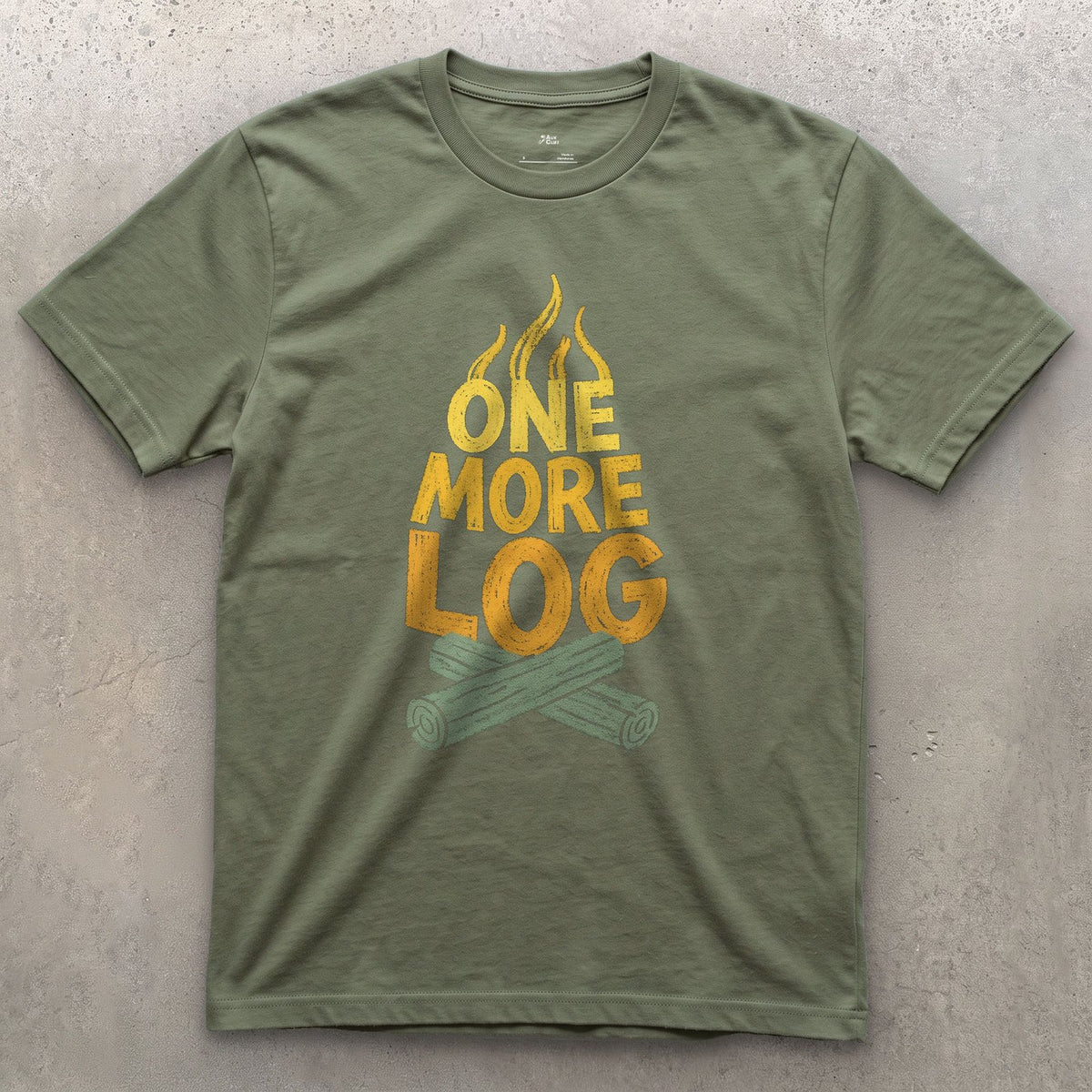 One More Log for the Camp Fire design on a Military Green Gildan Softstyle t-shirt