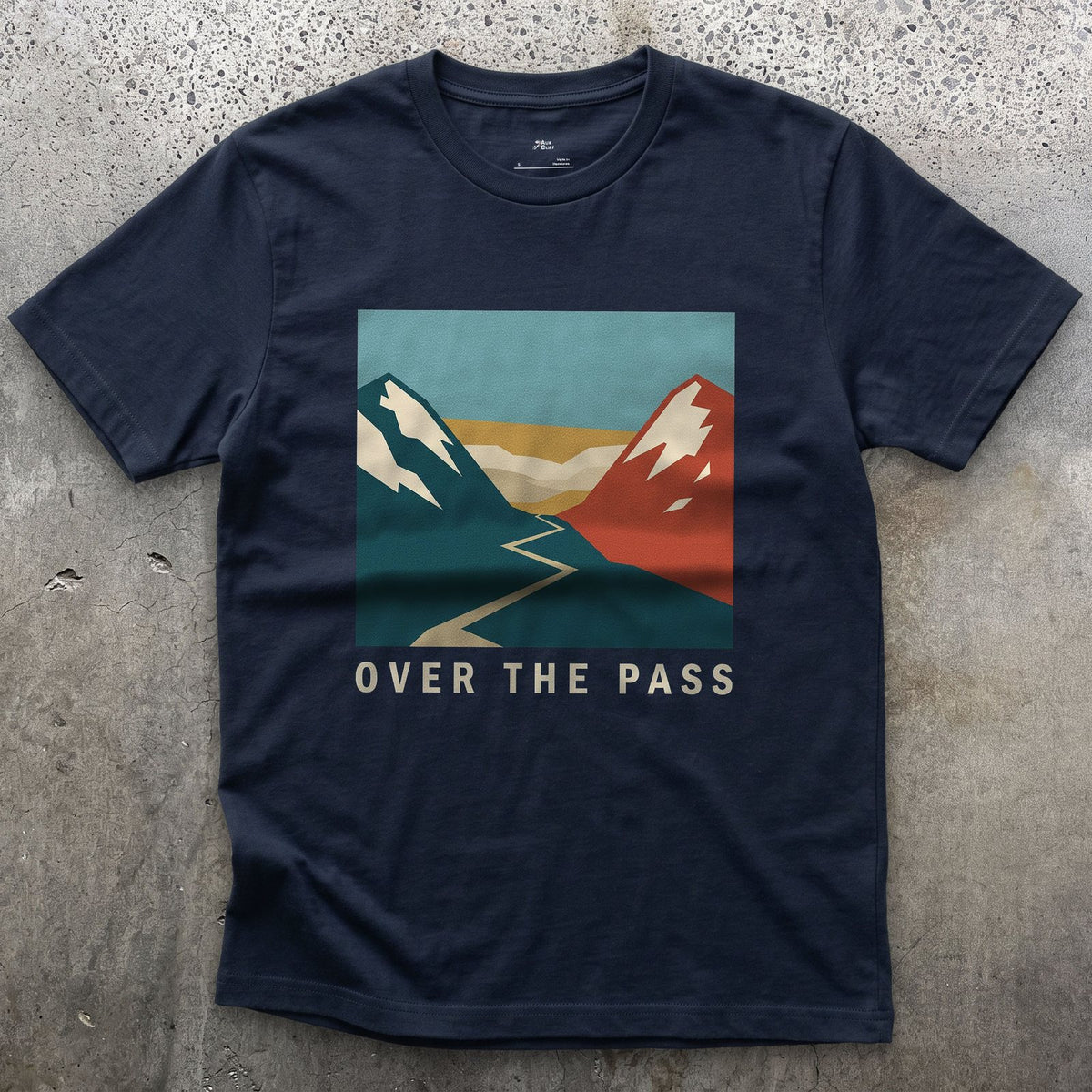 Over the Pass, Red Peaks and Blue design on a Navy Gildan Softstyle t-shirt