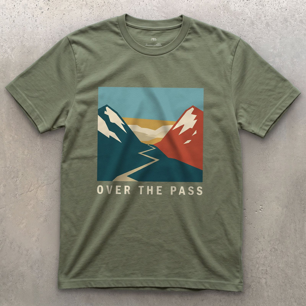 Over the Pass, Red Peaks and Blue design on a Military Green Gildan Softstyle t-shirt