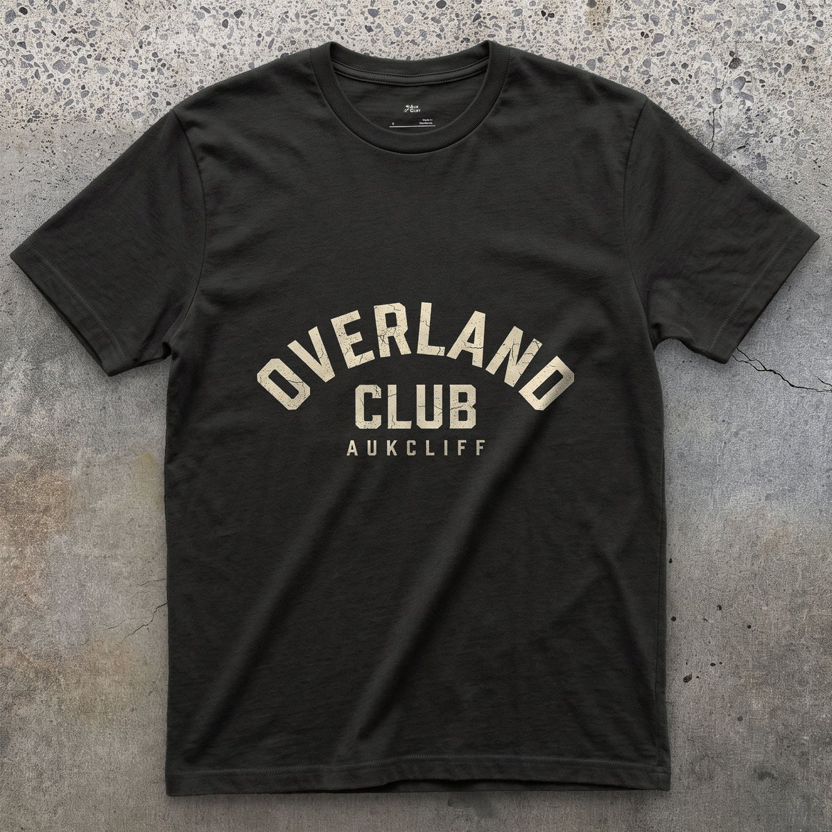 Overland Club Arch Badge design on a Black Gildan Softstyle t-shirt