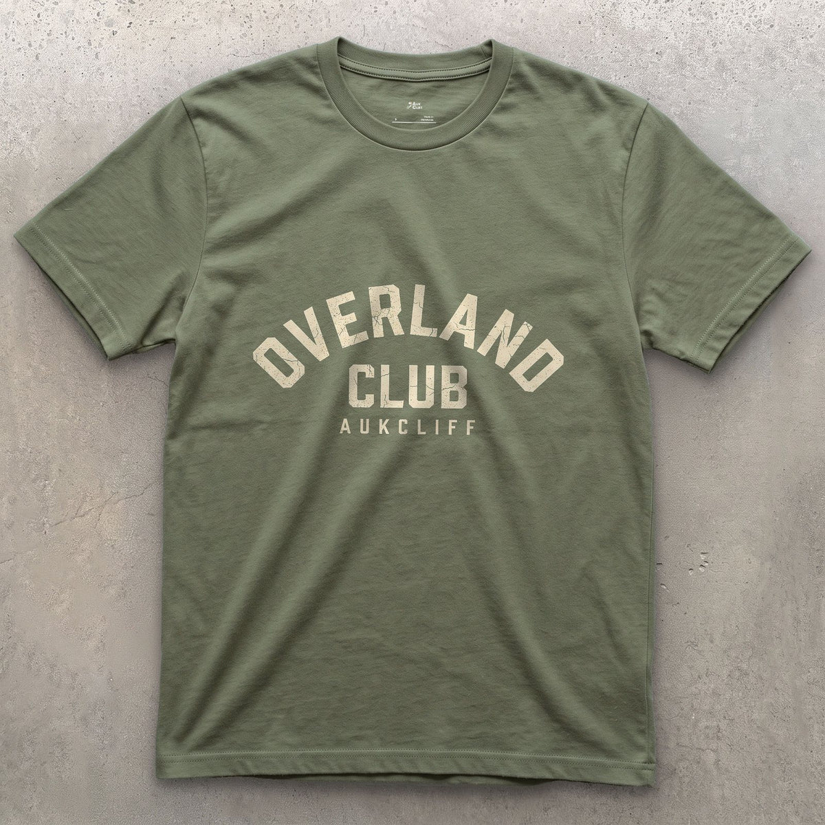 Overland Club Arch Badge design on a Military Green Gildan Softstyle t-shirt