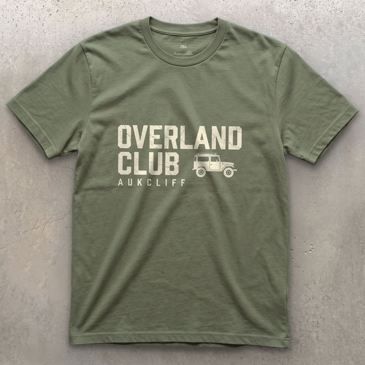 Overland Club Flush Left for a Corner design on a Military Green Gildan Softstyle t-shirt