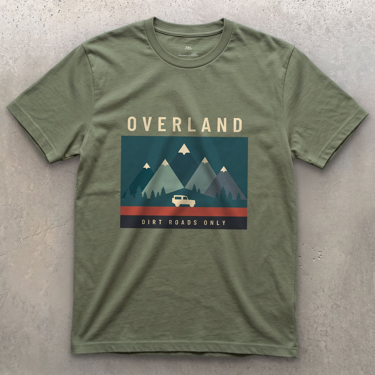 Dirt Roads Only, Small Wagon Between the Peaks design on a Military Green Gildan Softstyle t-shirt