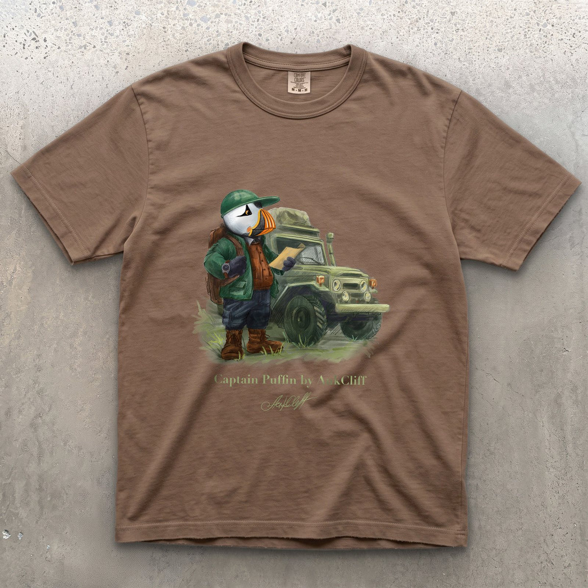Captain Puffin Overland Explorer on a Espresso Comfort Colors t-shirt