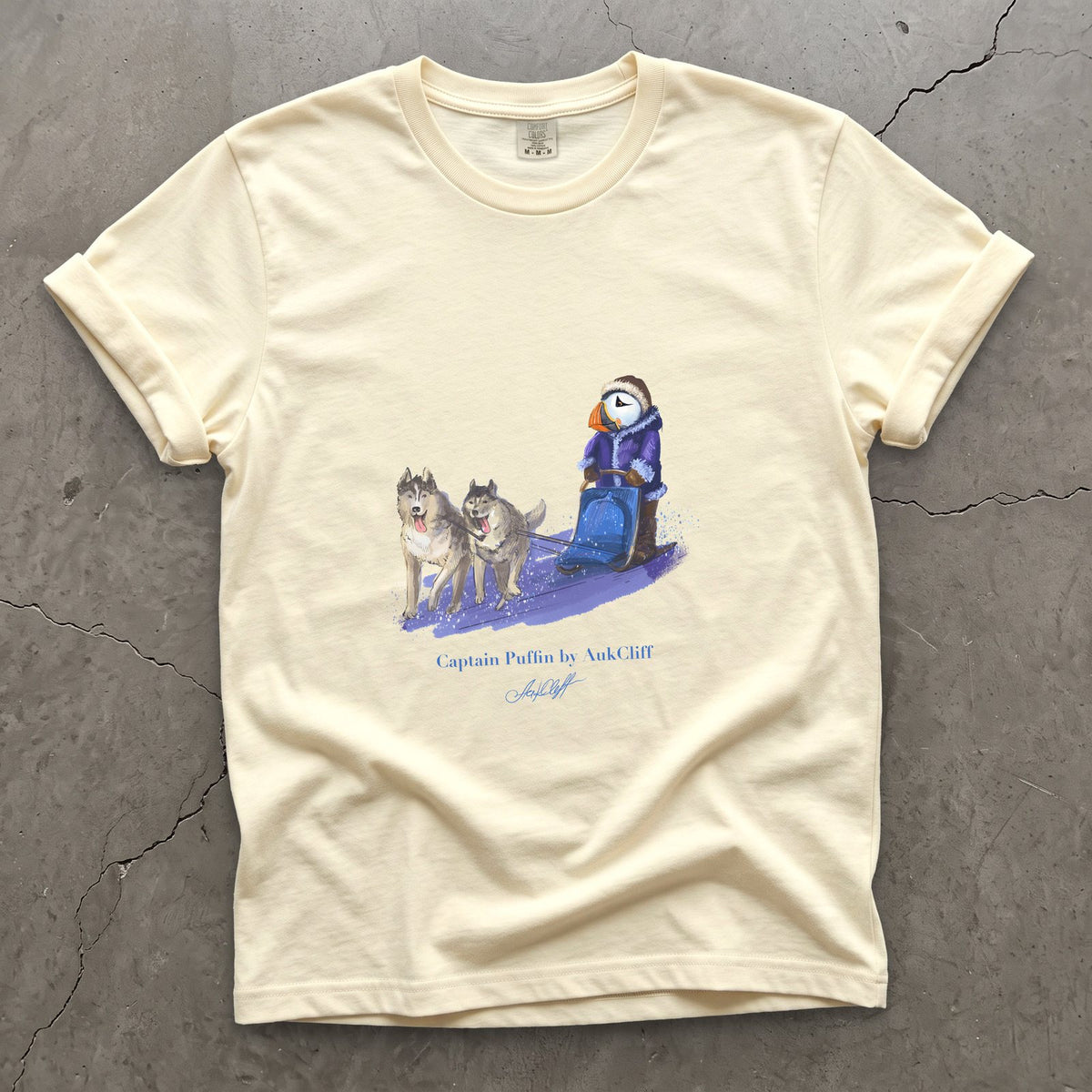 Captain Puffin Arctic Dog Sledder on a Ivory Comfort Colors t-shirt