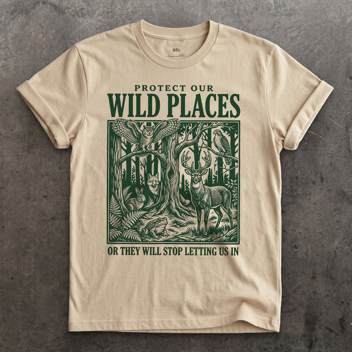 Protect Our Wild Places, or They Stop Letting Us In design on a Sand Gildan Softstyle t-shirt