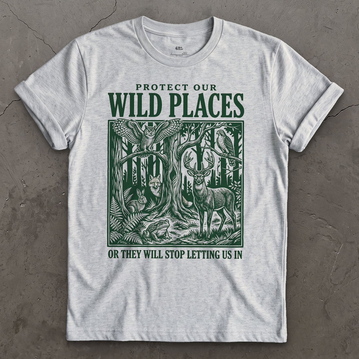 Protect Our Wild Places, or They Stop Letting Us In design on a Sport Grey Gildan Softstyle t-shirt