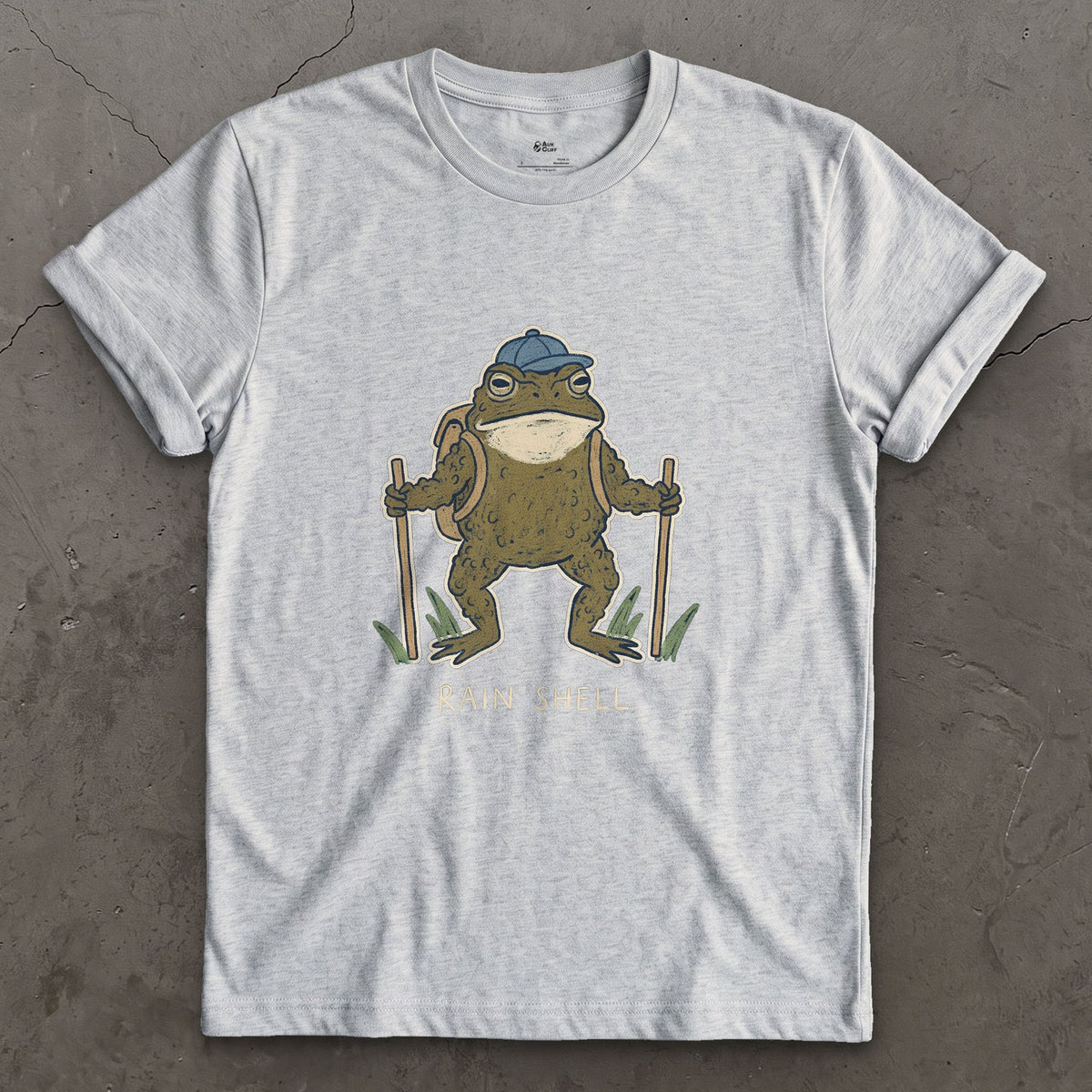 Rain Shell, Toad Hiker design on a Sport Grey Gildan Softstyle t-shirt
