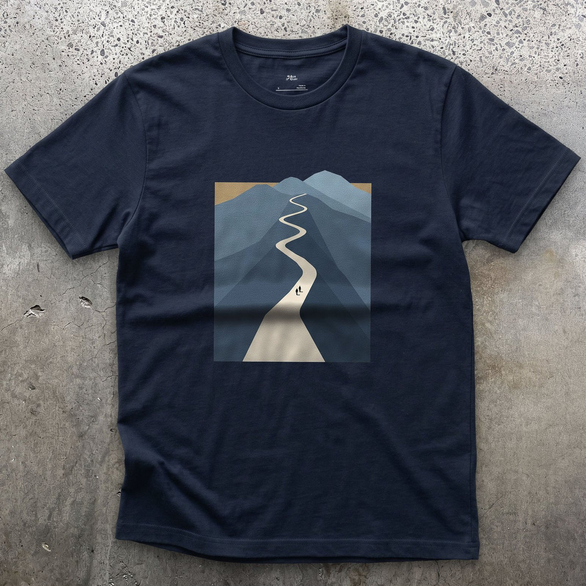 Small Against the Whole Mountain design on a Navy Gildan Softstyle t-shirt