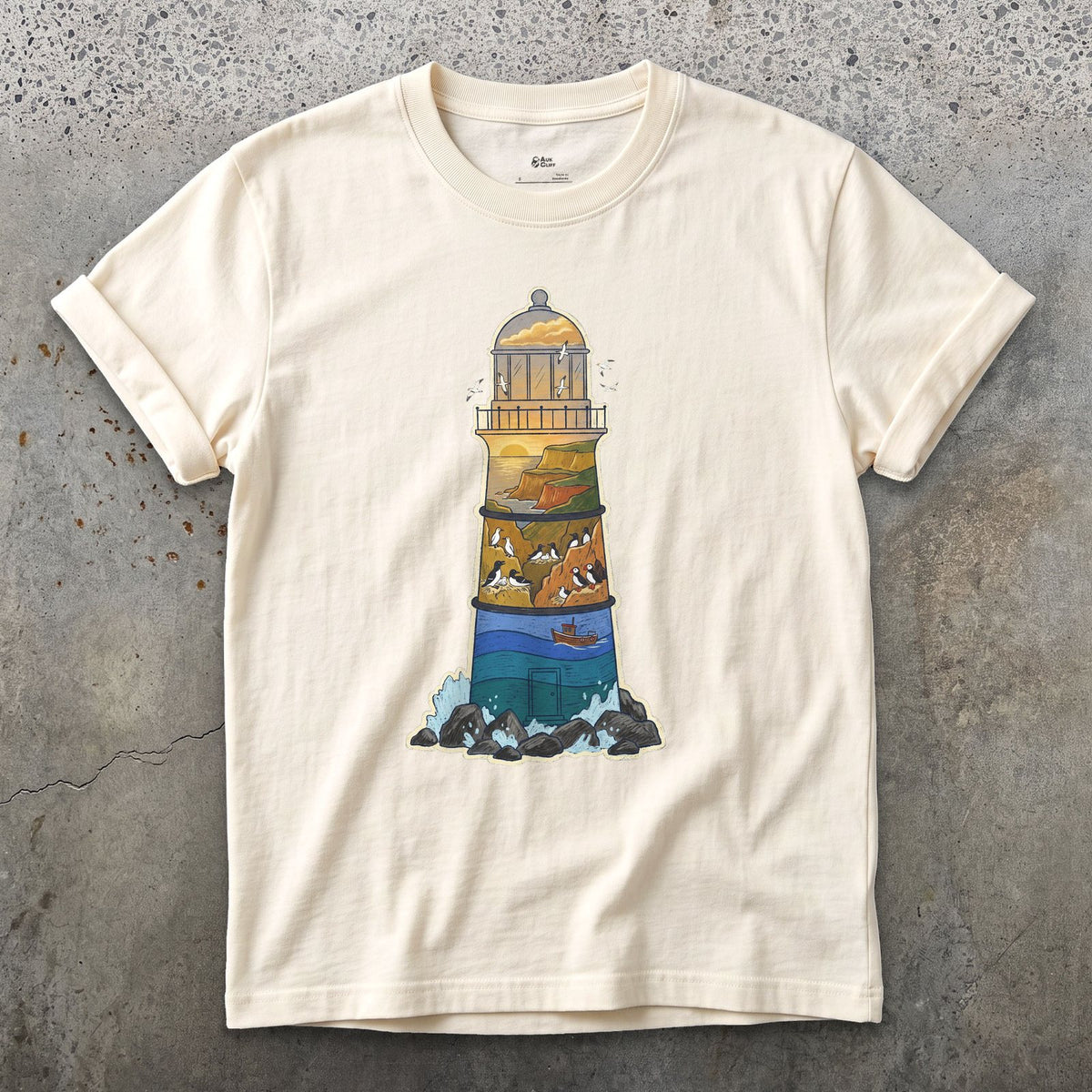 Rocky Headland, Lighthouse design on a Natural Gildan Softstyle t-shirt