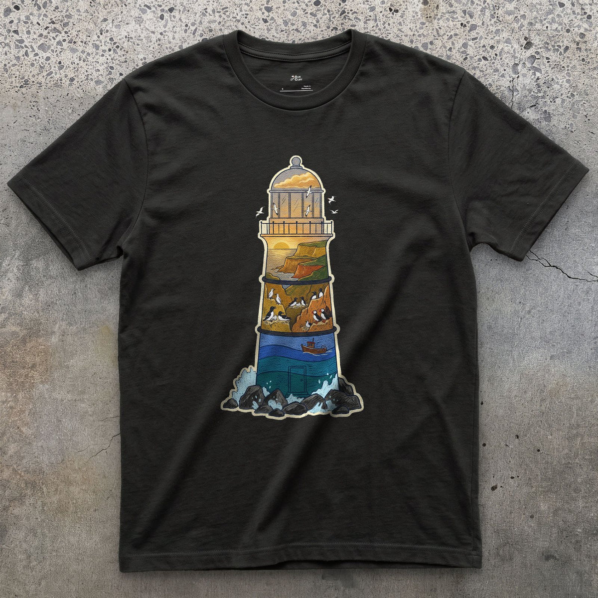 Rocky Headland, Lighthouse design on a Black Gildan Softstyle t-shirt