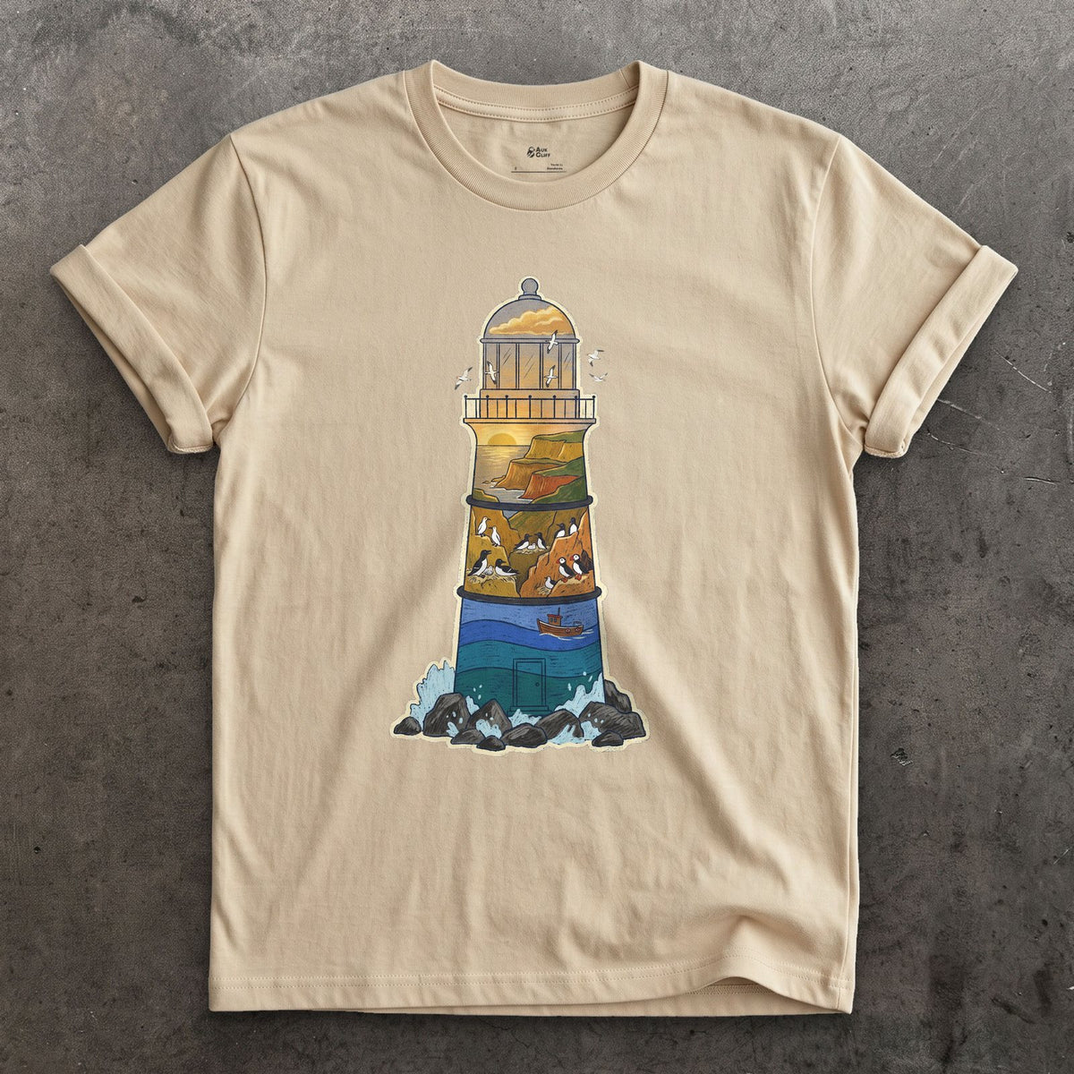 Rocky Headland, Lighthouse design on a Sand Gildan Softstyle t-shirt