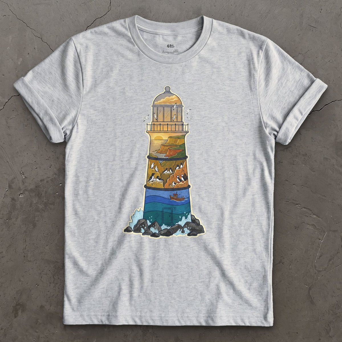 Rocky Headland, Lighthouse design on a Sport Grey Gildan Softstyle t-shirt
