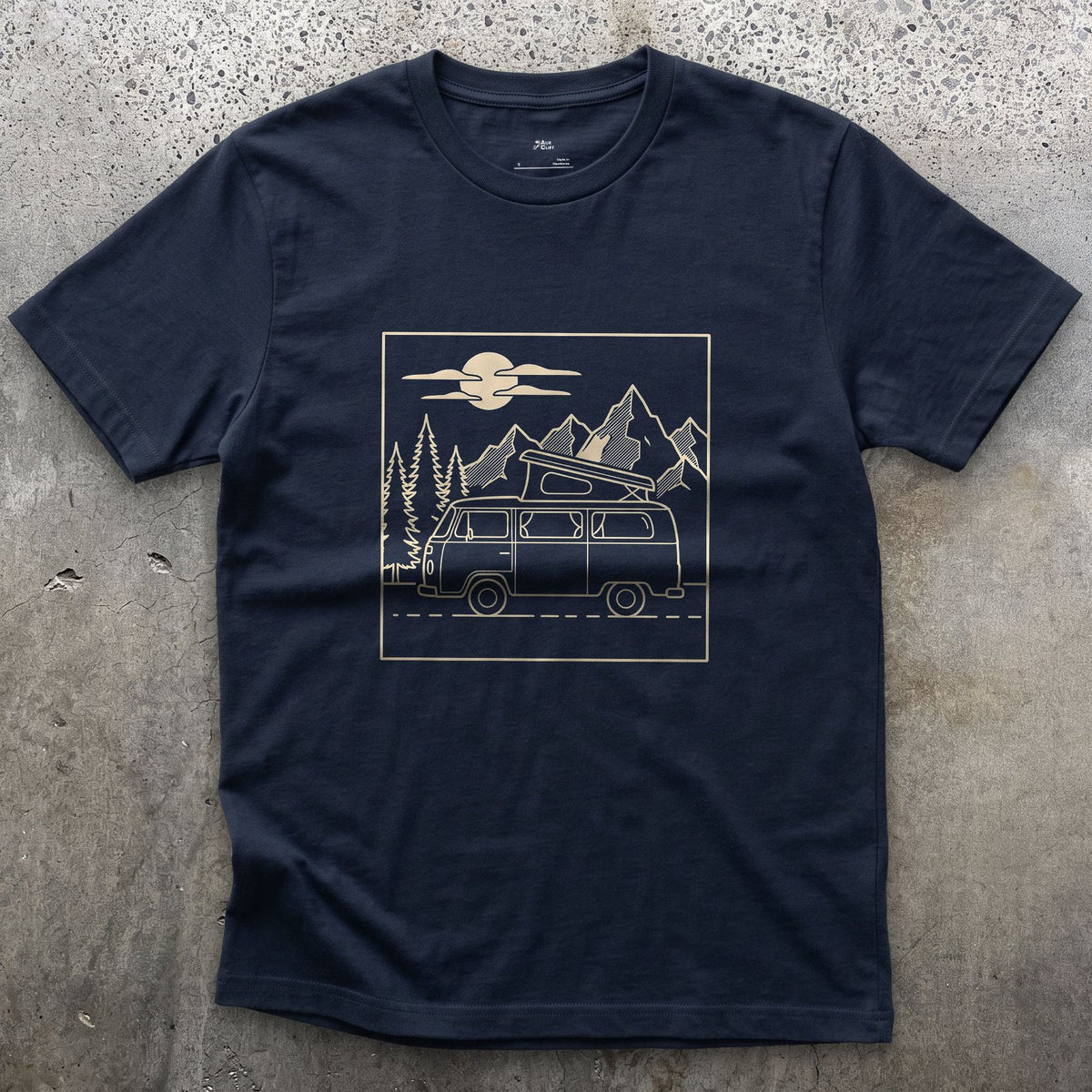 Roof Popped Under Pines and a Rising Moon design on a Navy Gildan Softstyle t-shirt
