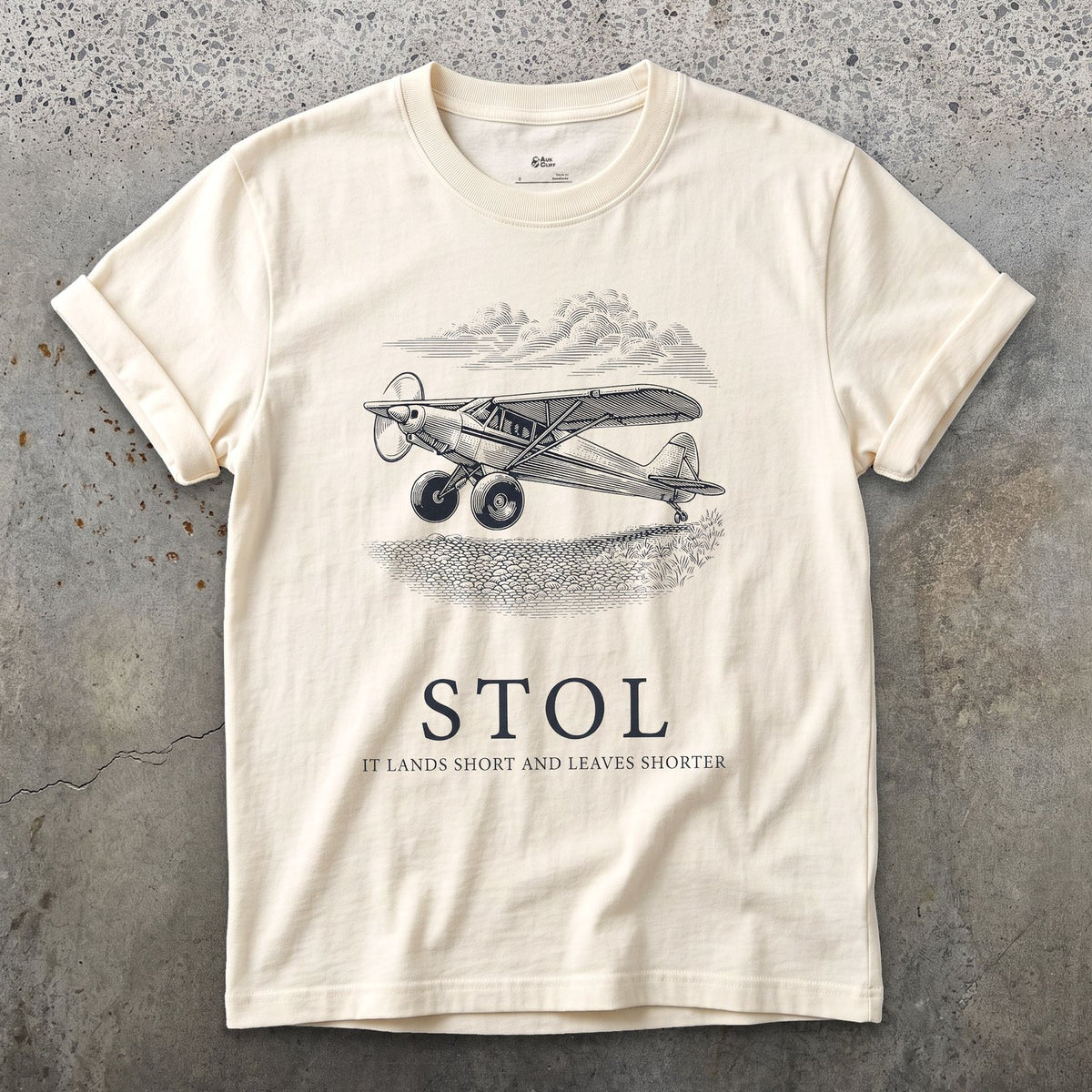 STOL, Short Take Off and Landing design on a Natural Gildan Softstyle t-shirt