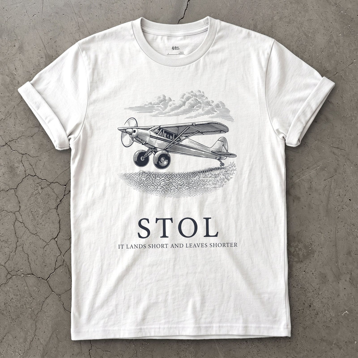 STOL, Short Take Off and Landing design on a White Gildan Softstyle t-shirt