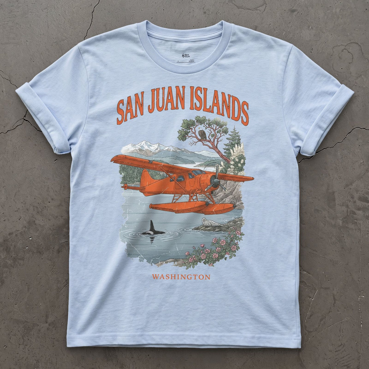 San Juan Islands Bush Plane design on a Light Blue Gildan Softstyle t-shirt