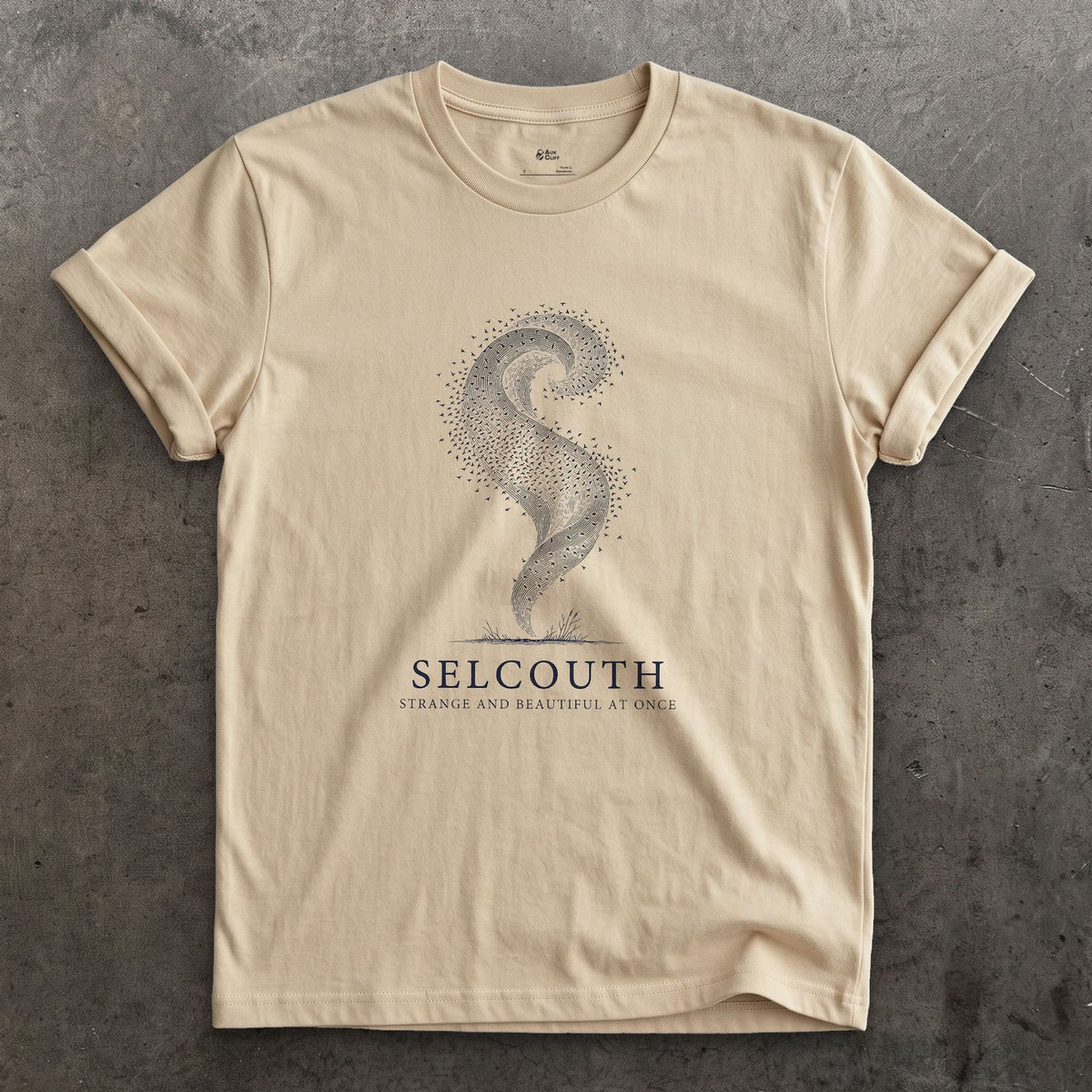 Selcouth, Strange and Beautiful at Once design on a Sand Gildan Softstyle t-shirt
