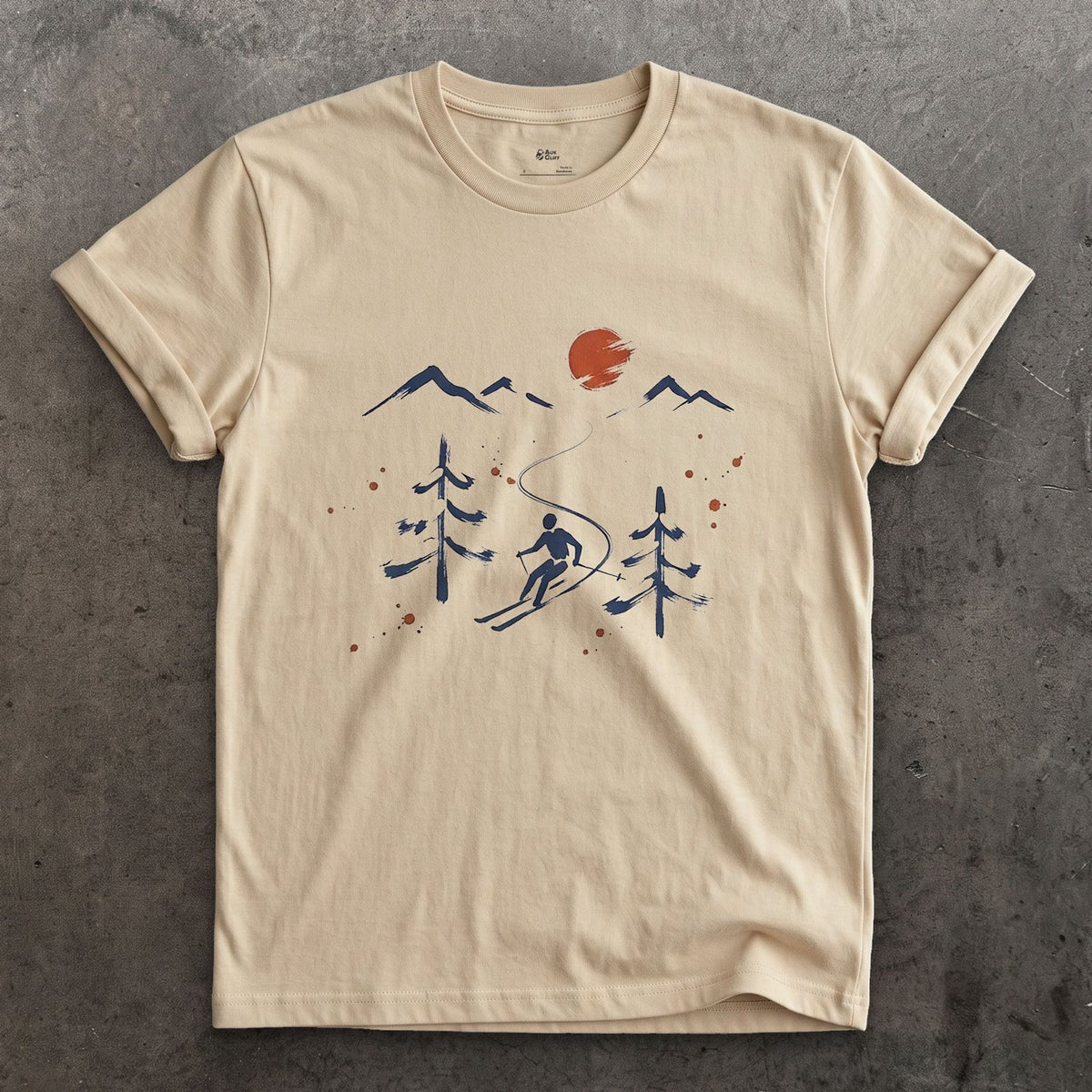 Pines and Peaks Ski design on a Sand Gildan Softstyle t-shirt