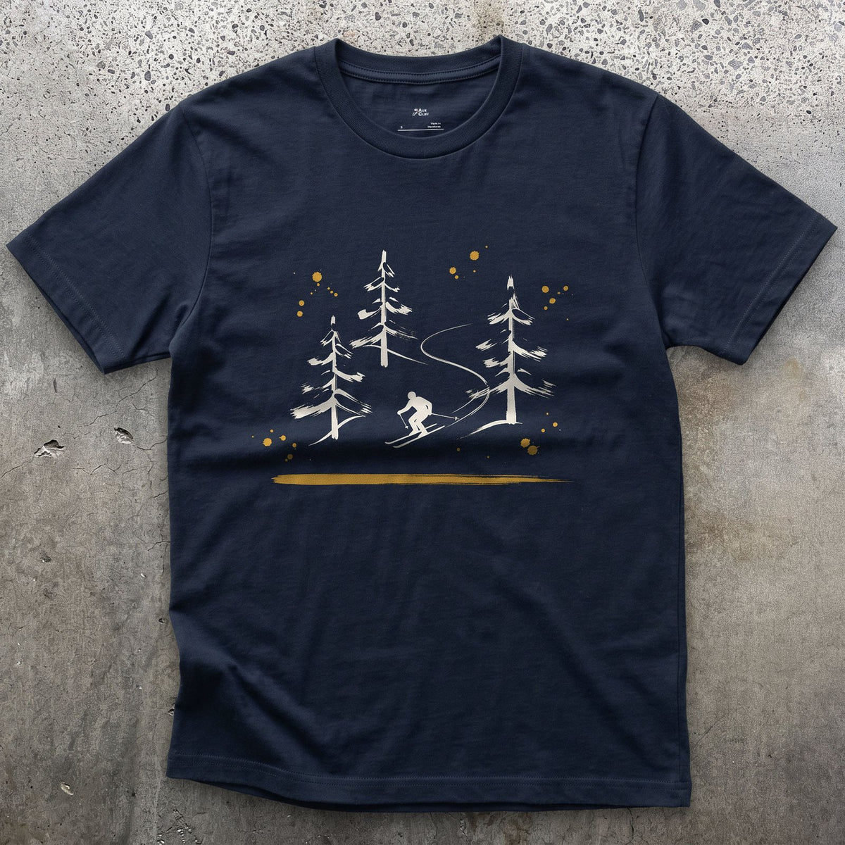Skier Through the Pines design on a Navy Gildan Softstyle t-shirt