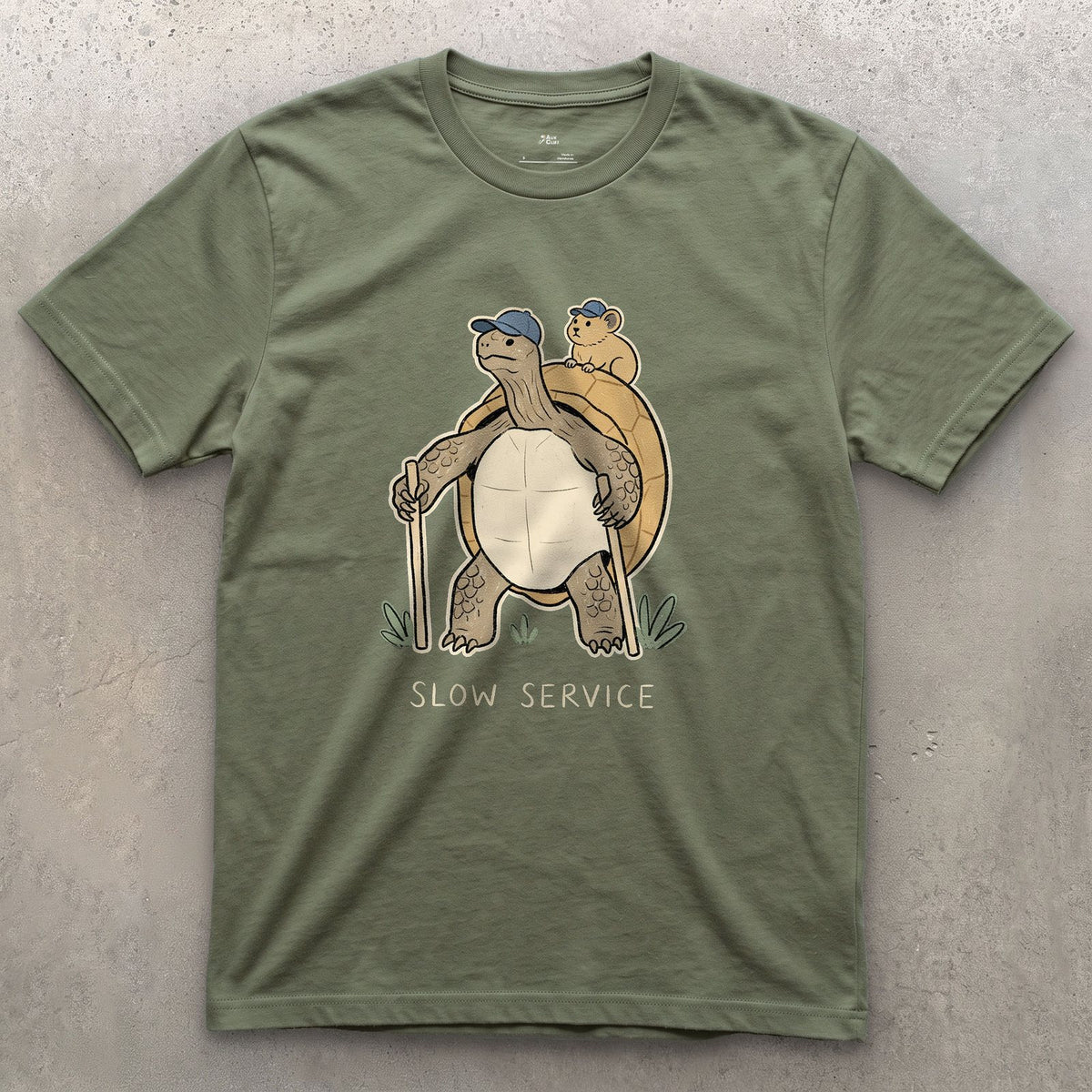 Slow Service, Tortoise Hiker and Pika design on a Military Green Gildan Softstyle t-shirt