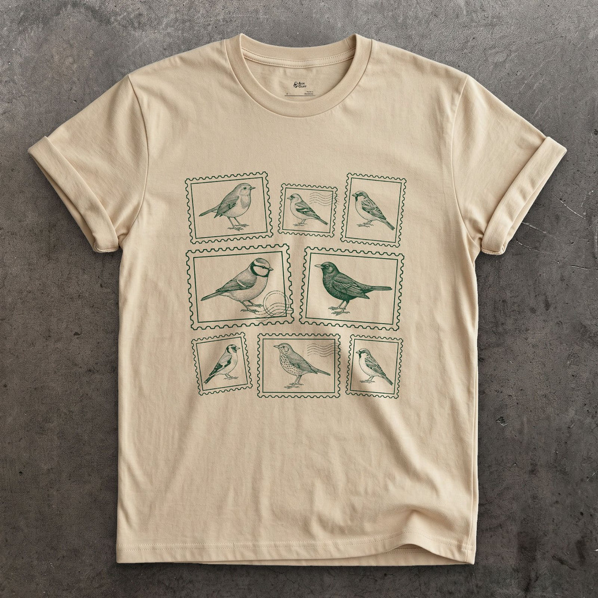 Nine Stamps, One Bird on Each design on a Sand Gildan Softstyle t-shirt
