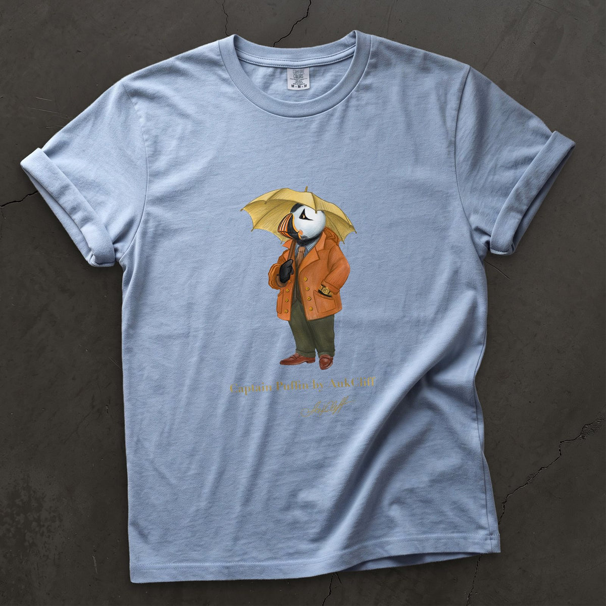Captain Puffin The Spring Wanderer on a Washed Denim Comfort Colors t-shirt
