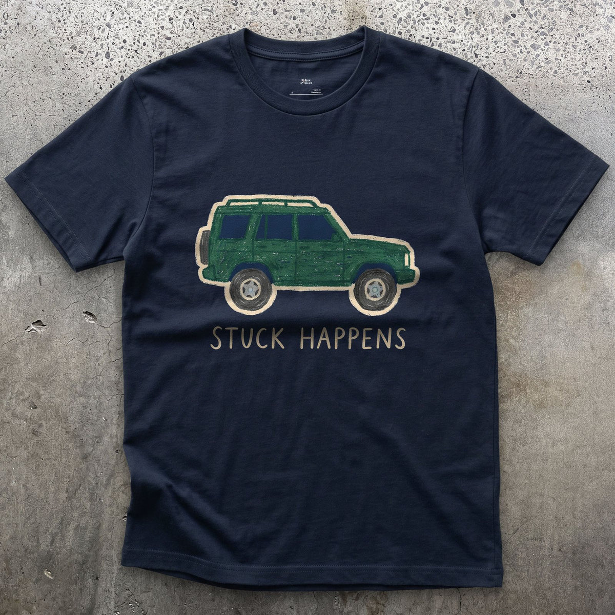 Stuck Happens, Green Wagon in Profile design on a Navy Gildan Softstyle t-shirt