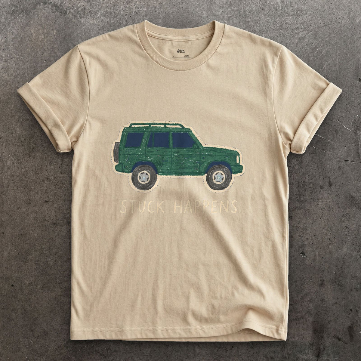 Stuck Happens, Green Wagon in Profile design on a Sand Gildan Softstyle t-shirt