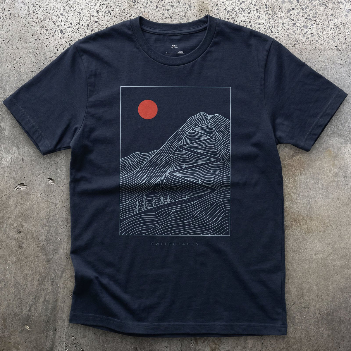 Doubling Back Along the Switchbacks Toward a Red Sun design on a Navy Gildan Softstyle t-shirt